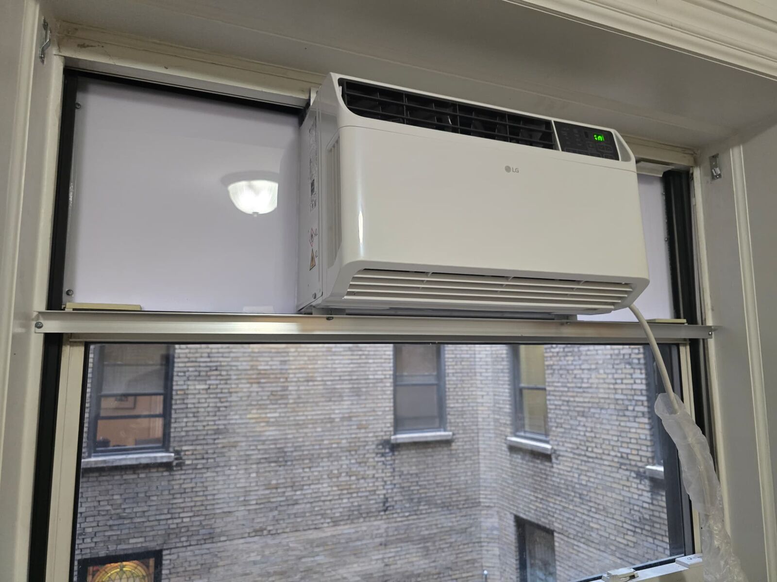 White plexiglass AC installation 3
