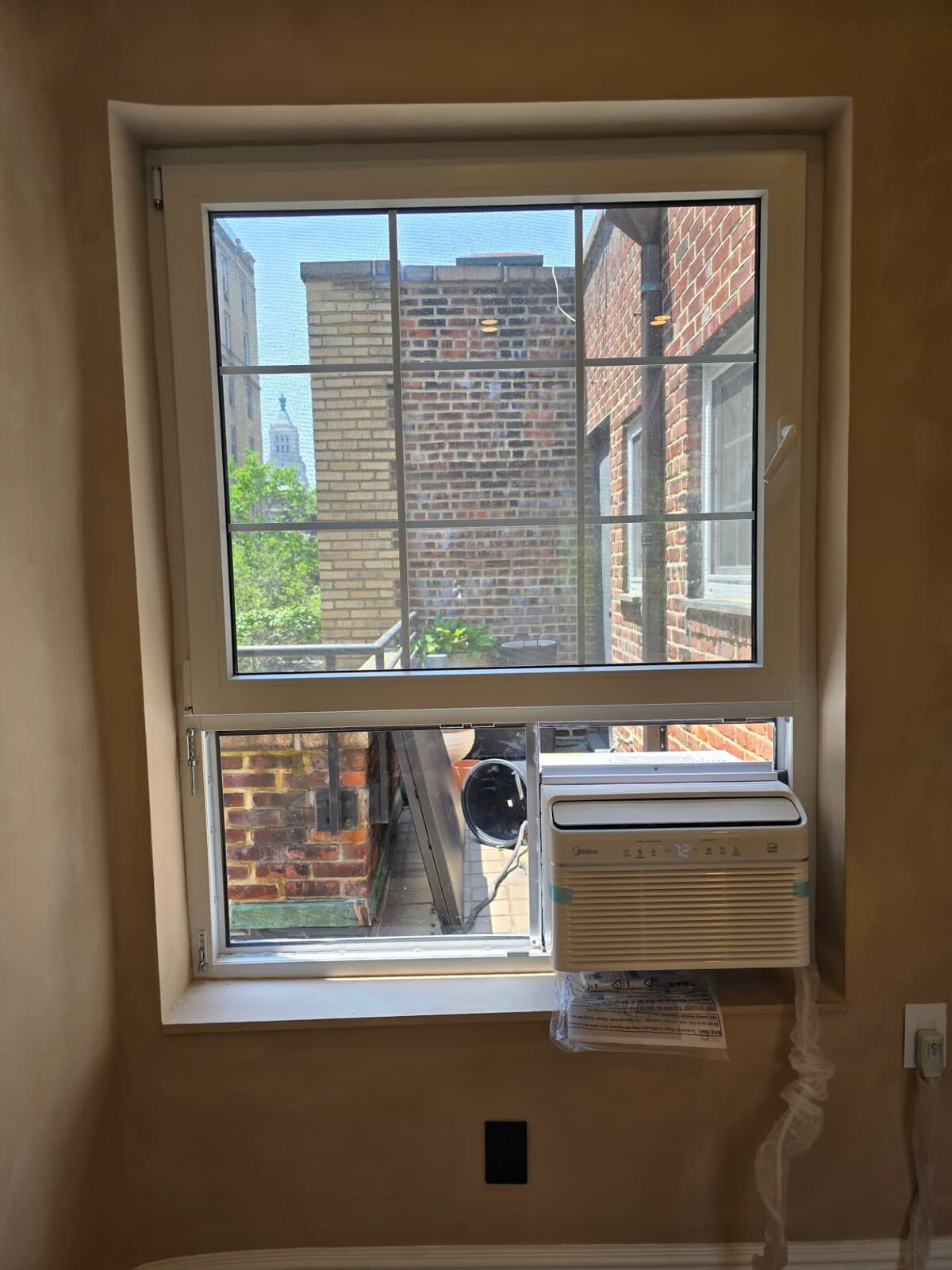 Clear plexiglass AC installation 2