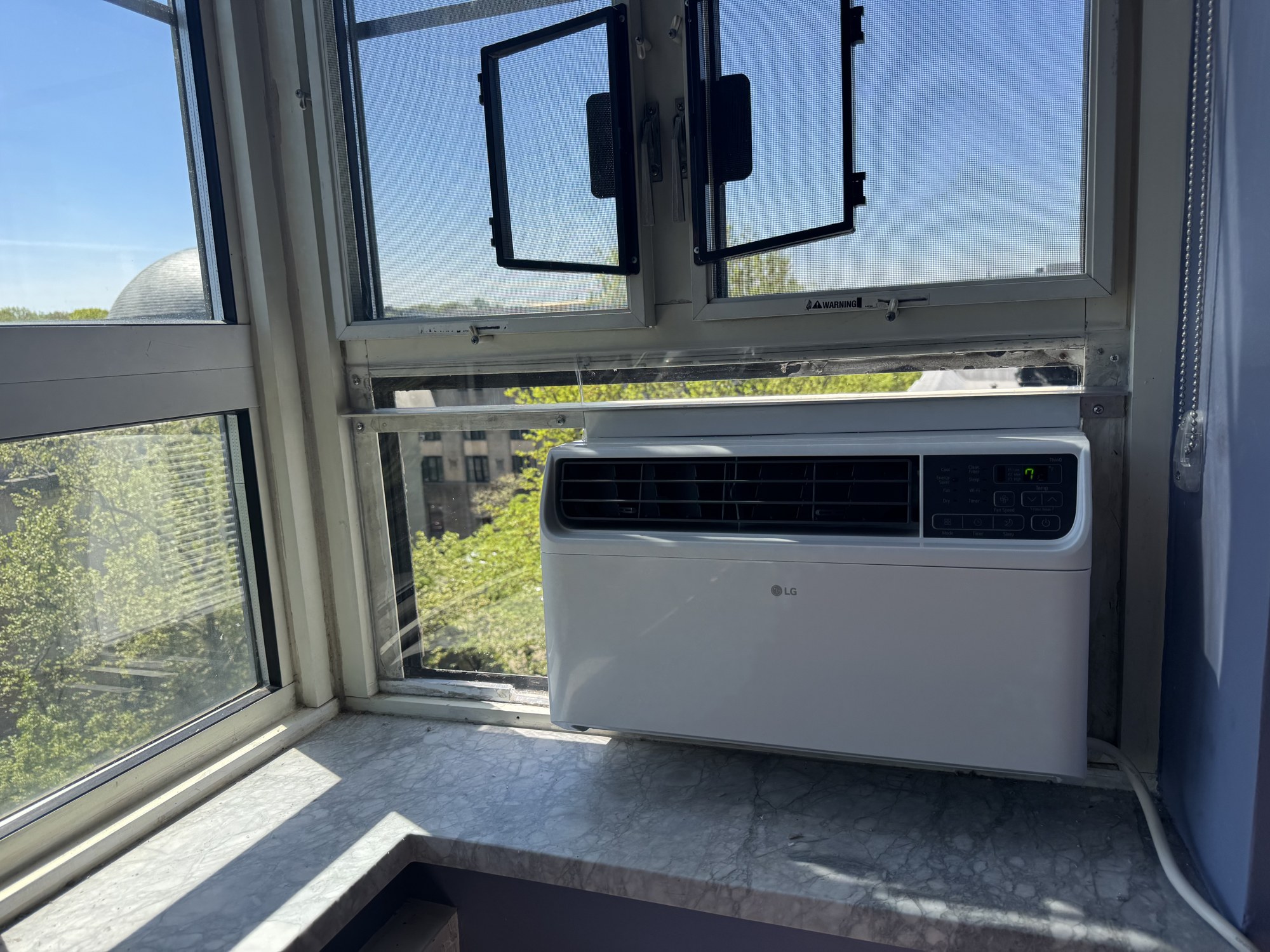 Clear plexiglass installation in a fixed window